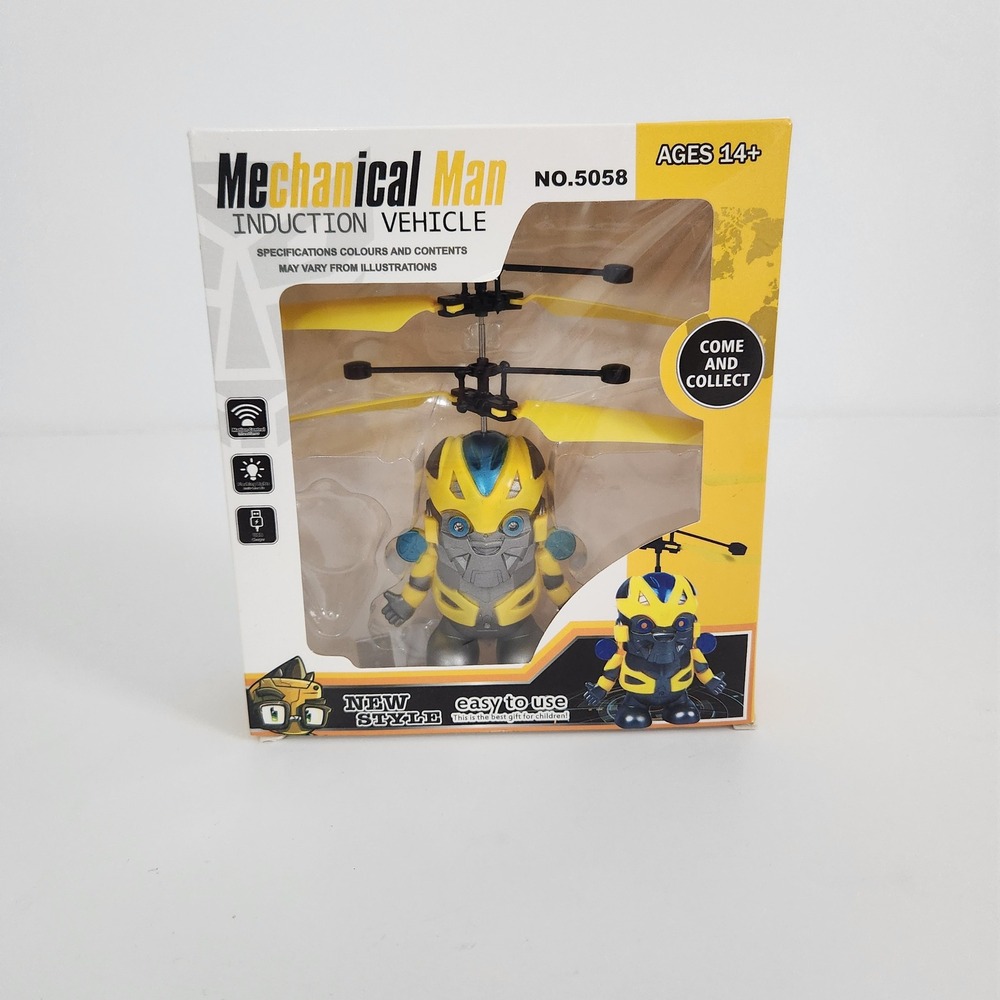 Mechanical Man Induction Vehicle NO.5058 Yellow Blue Flying Robot Toy USB Charge